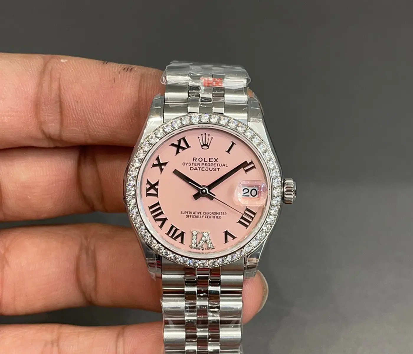 Datejust Pink Dial with Roman Numerals Diamond Bezel Jubilee Bracelet